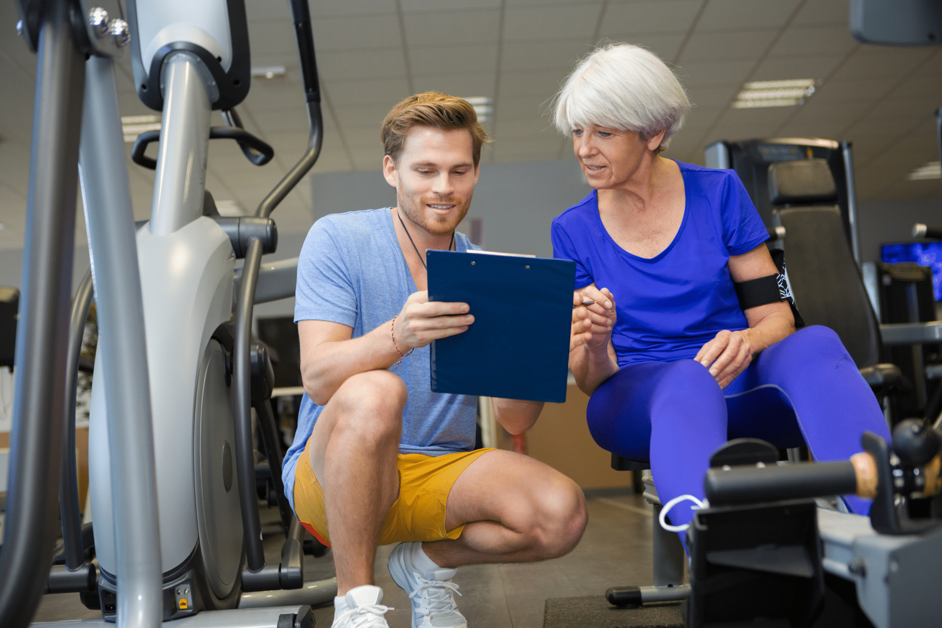 Clubwise | personal trainer working with elderly woman